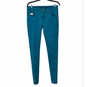 Teal blue skinny jeans. Size 4. RS 86